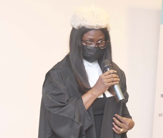 Justice Olivia Obeng Owusu, a High Court judge, inducting the new chartered tax practitioners into the Chartered Institute of Taxation Ghana at the 2022 graduation, orientation and induction ceremony of the institute
